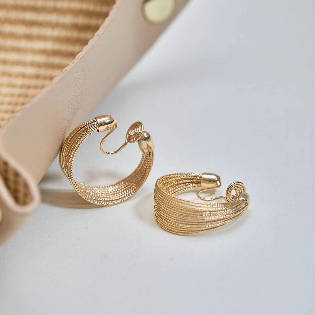 Simple geometric earrings and ear clips in silver and gold colour options