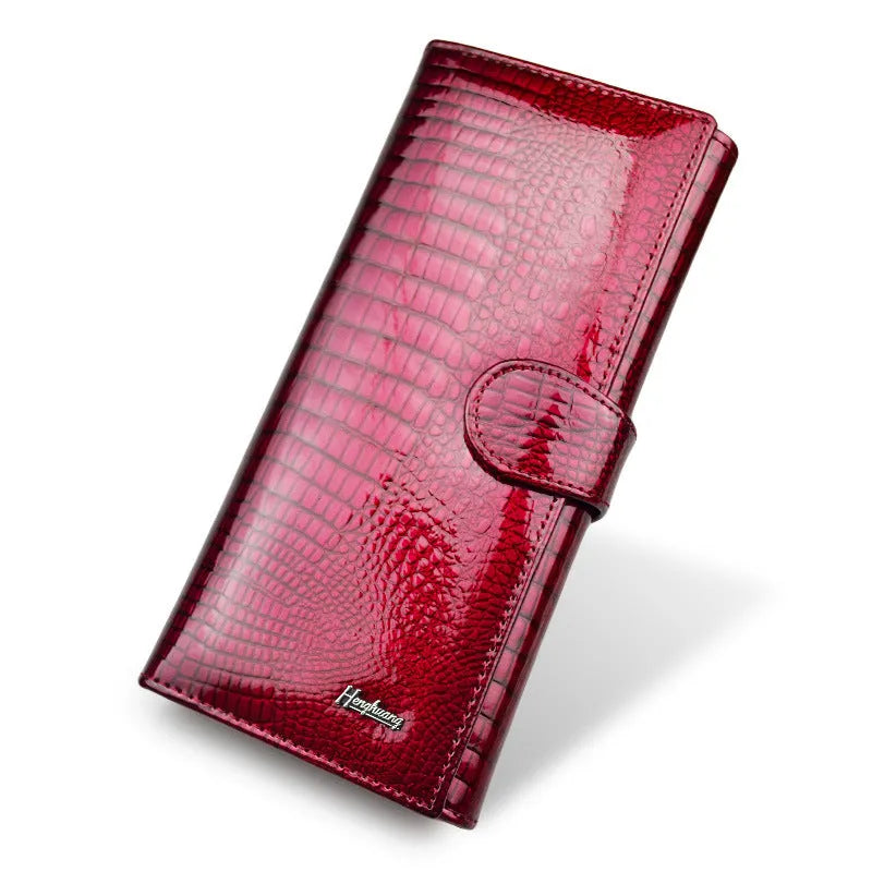 Women's leather coin purse with crocodile pattern texture in red colour