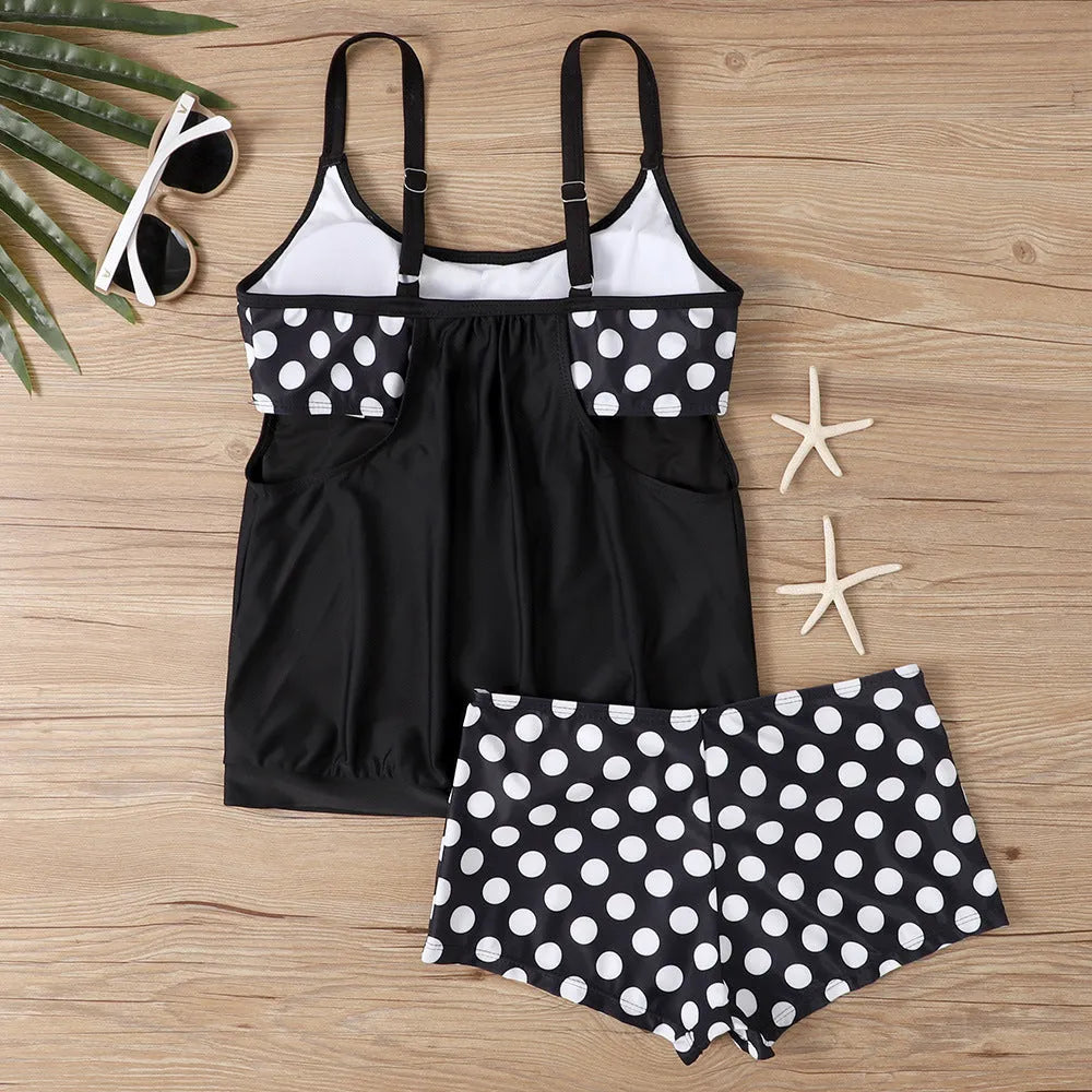 Women's black polka dot high-waist boxer swimsuit briefs for swimming and fitness.