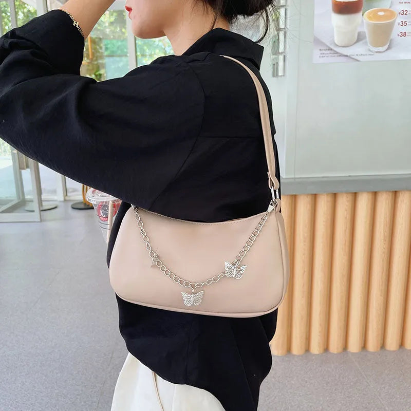 Horizontal square butterfly chain underarm bag in four colour options