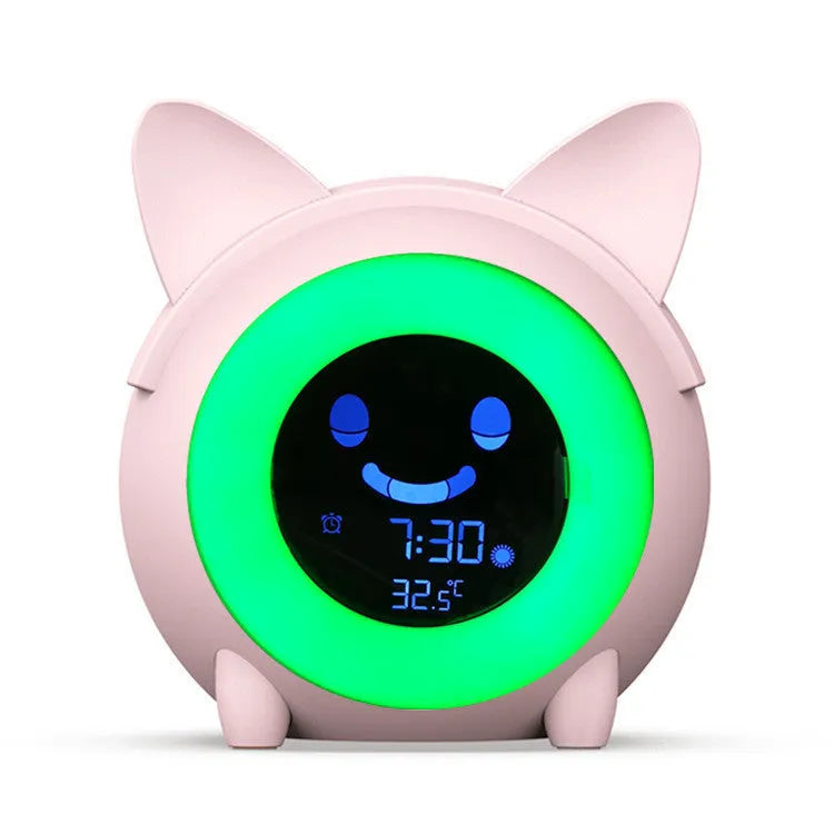 Small round plastic alarm clock with LCD number display in light blue, with alarm and thermometer functions for home or office use
