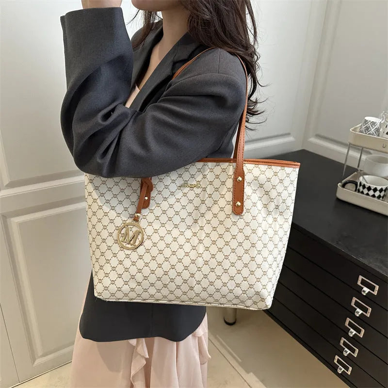 Black PU leather street-style shoulder bag with sewing thread detail, shown next to grey, brown, and white colour options.
