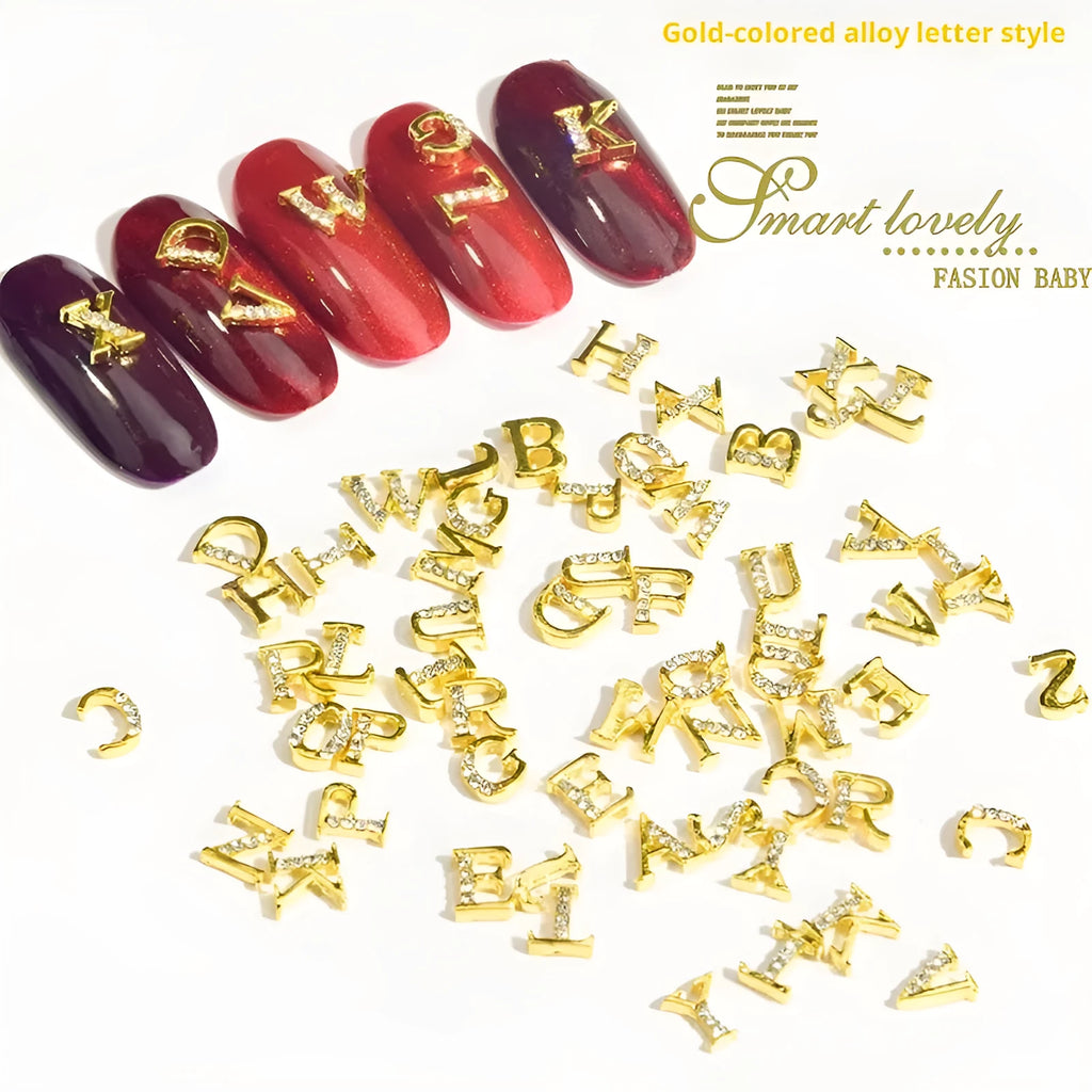 Gold alloy letter A nail ornament charm with crystal detail on a square chain base