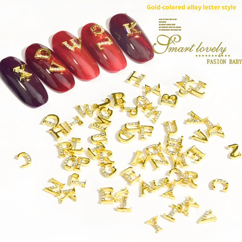 Gold alloy letter A nail ornament charm with crystal detail on a square chain base