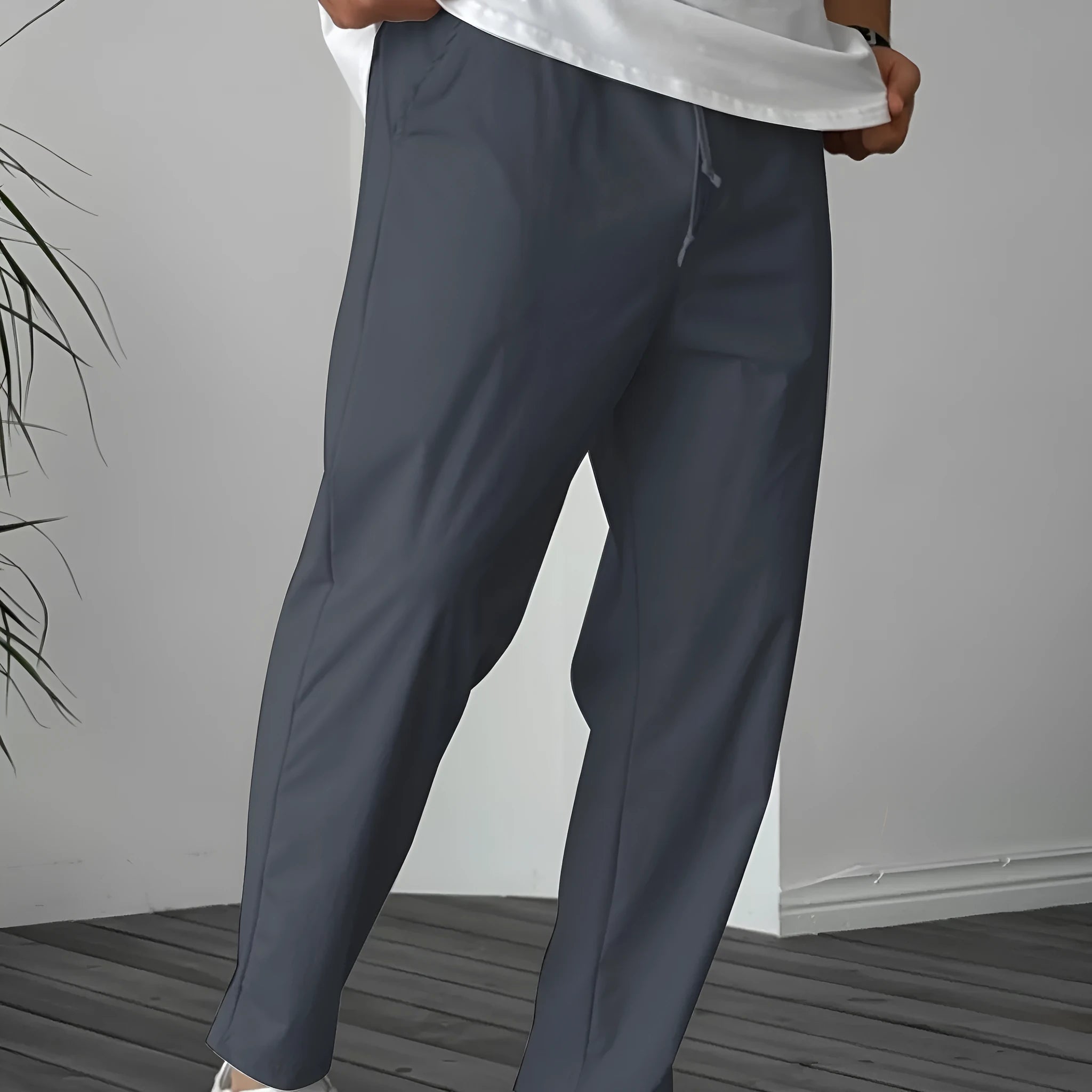 Men's khaki straight-leg casual trousers with a drawstring waist and ribbon pocket.