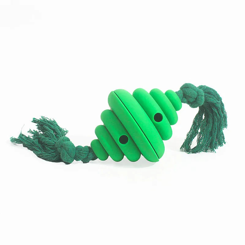 Green and yellow food-dispensing silicone dog ball with an attached rope for tug-of-war.