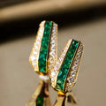 Women's geometric faux emerald clip-on earrings with round triangle design, inlaid zircon, yellow gold copper finish