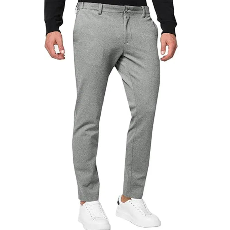 Men's slim-fit stretch chino trousers in khaki colour, showing tapered leg and zip fly detail.