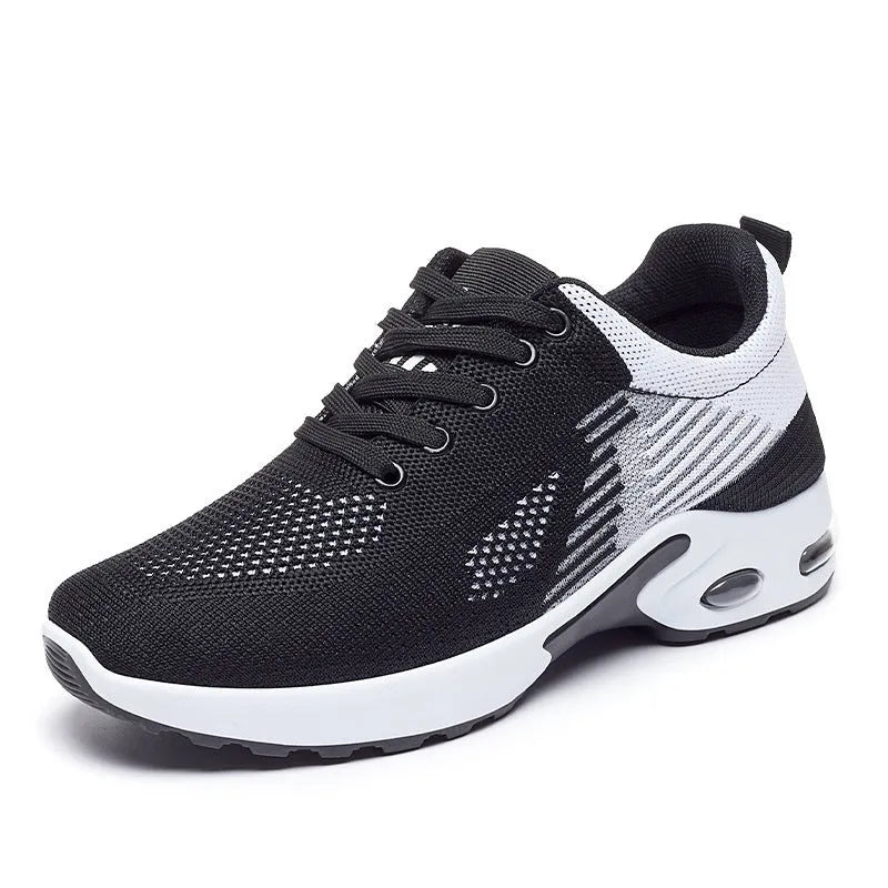 Women's Flyknit casual running shoes in a stripe pattern, showing front lace-up and round toe design.