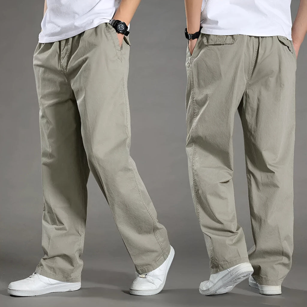 Men's cotton loose straight trousers zip placket workwear style, black colour, on model