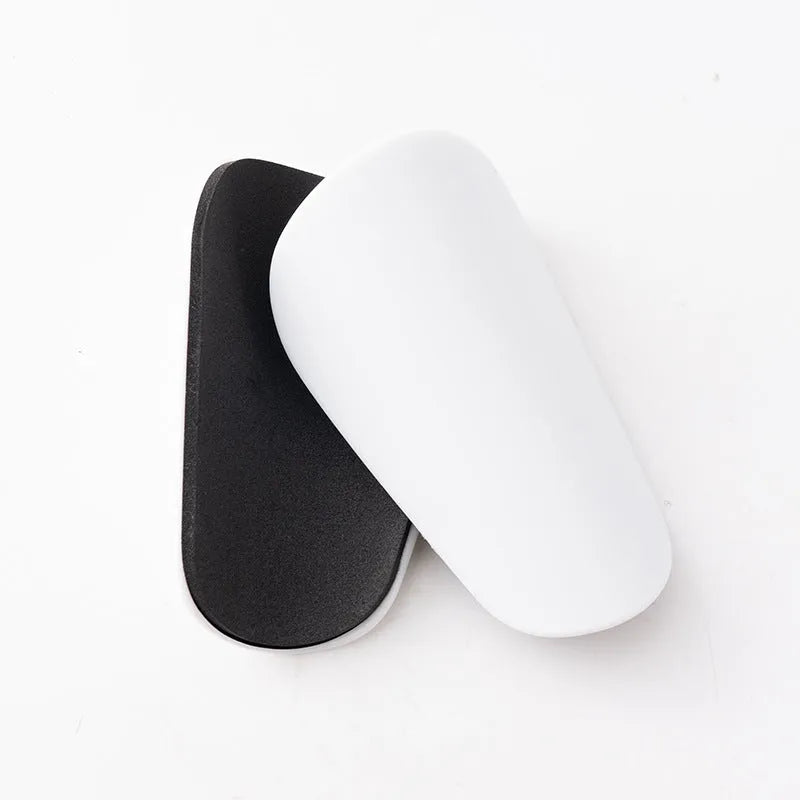 PU mini shin guards in black, white, red, and dream blue colours with S and XS sizing codes