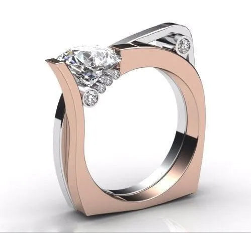 Rose gold electroplated geometric couple ring with zircon inlay showing side profile and detail