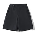 Men's solid colour quick-drying sports shorts with elastic construction, shown in khaki colour