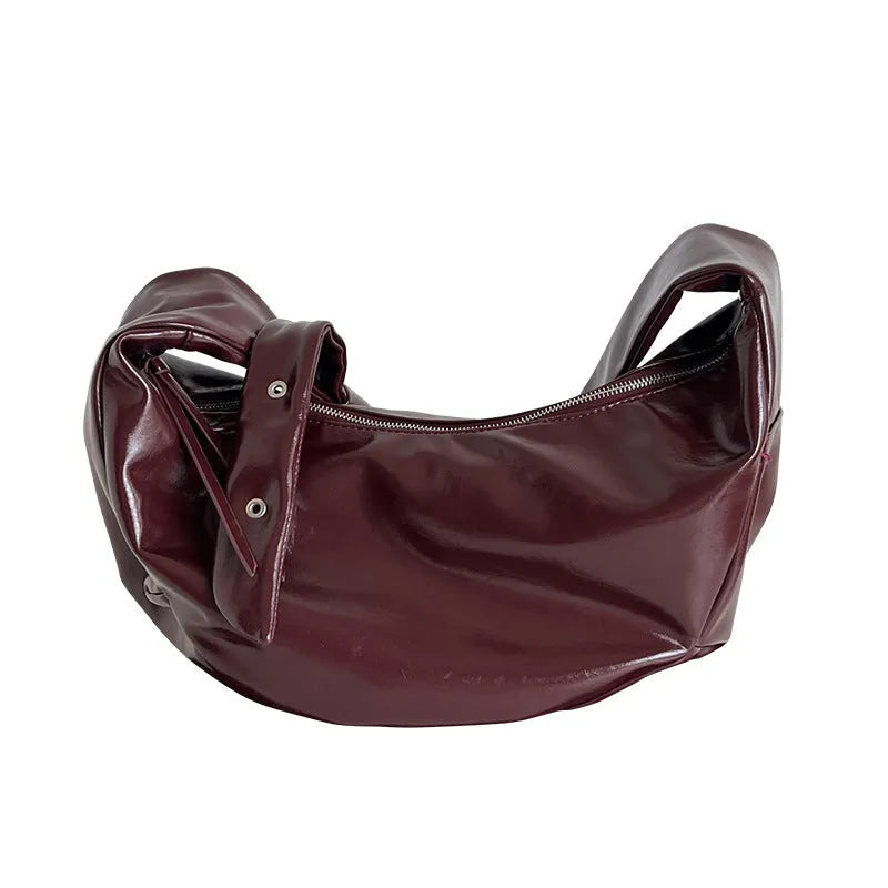 Soft PU large capacity commuter shoulder bag in black, horizontal square shape, with single shoulder strap
