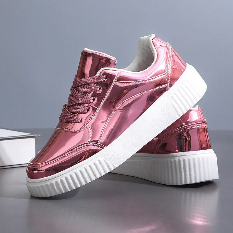 Thick-soled sequin sneakers in metallic rose gold with platform heel and round toe