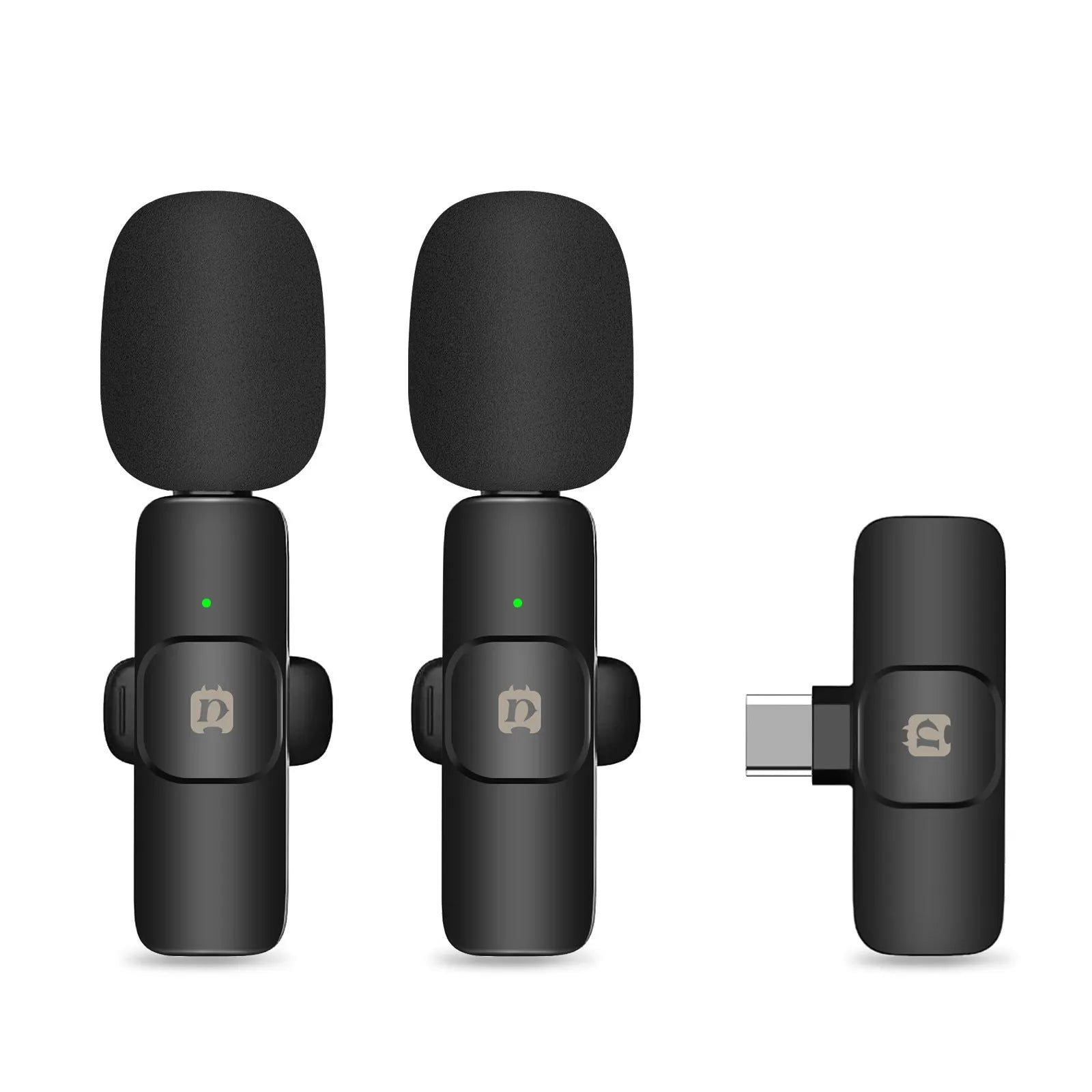 Wireless carbon fibre neckline clip microphone transmitter on a black background with storage box and accessories