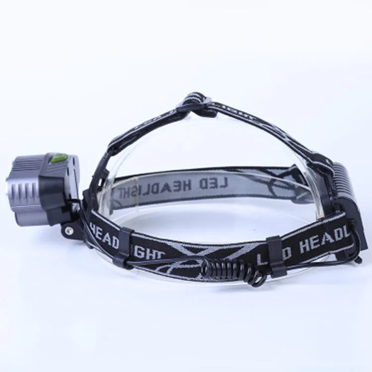 Head-mounted LED torch with long-range beam for outdoor camping and hiking activities.