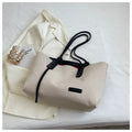 Shoulder bag in Oxford cloth with double straps, available in Black and Brown, size 46x32x27cm