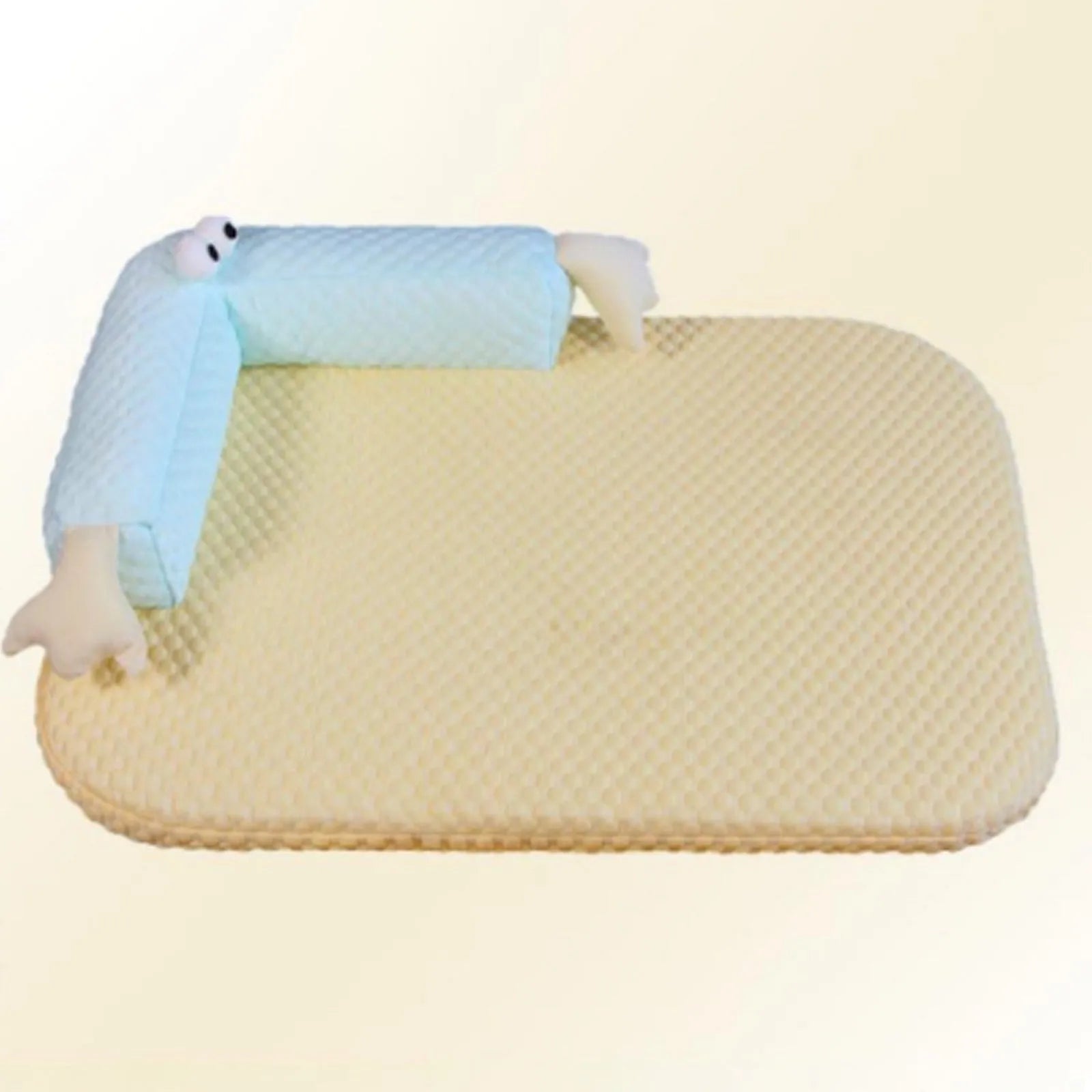 Blue pet cushion with large monster face design for dogs and cats on a wooden floor.