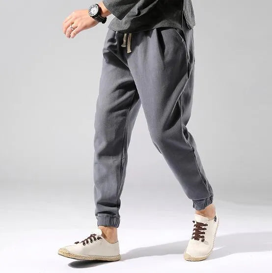 Irukite men's high waist loose winter trousers in black with belt and zip fly, plus velvet lined