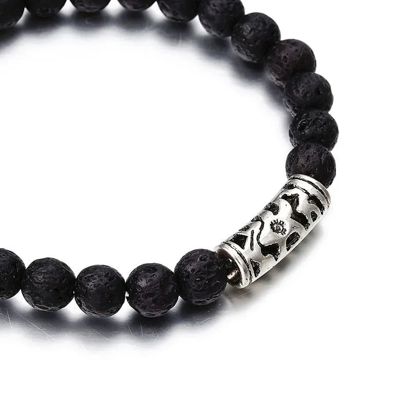 Classic acrylic blue beaded bracelet on stretch cord on a light background