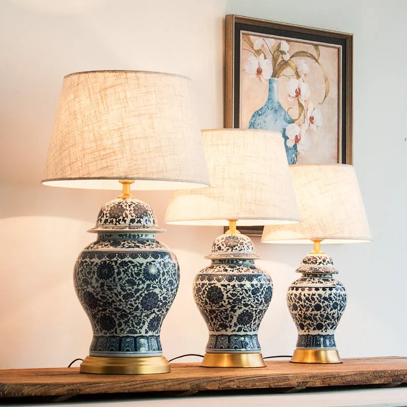 Blue and white porcelain Chinese table lamp with handmade ceramic body and cloth shade