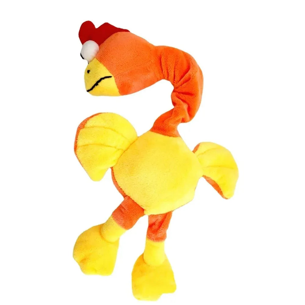 Green squeaky dog toy shaped like a chicken with bite resistant chew texture