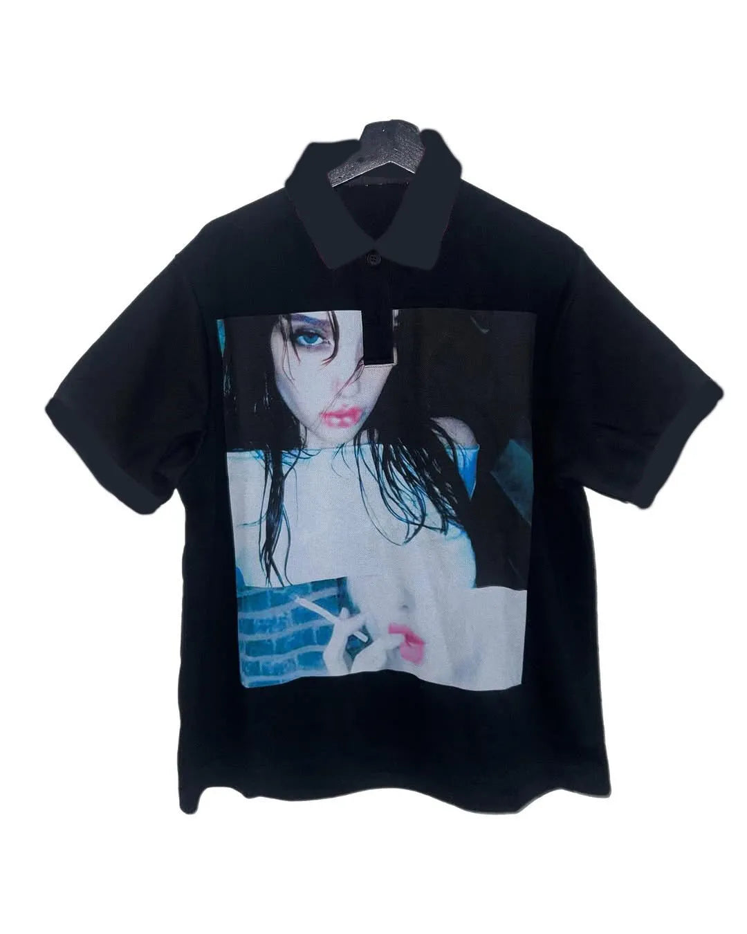 Short-sleeved printed polo shirt in polyester fabric on a hanger