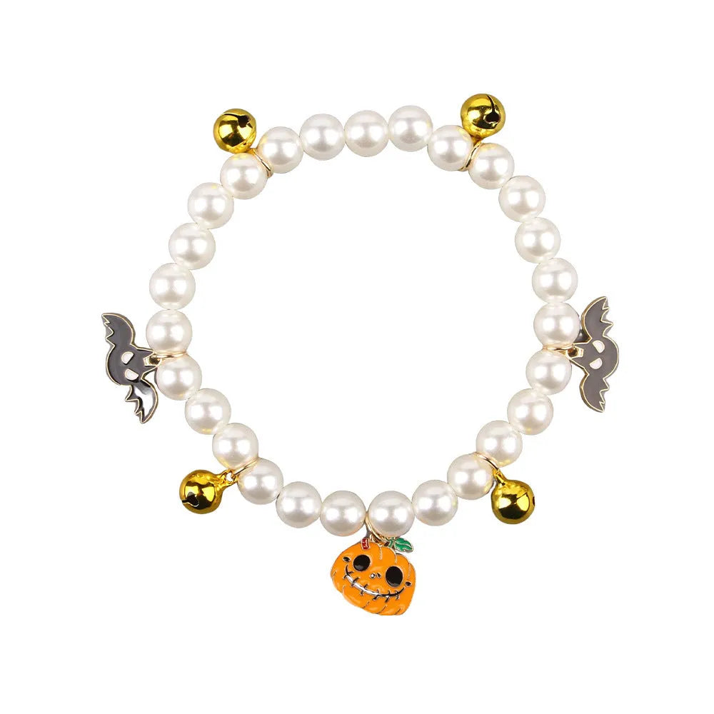 Halloween cat collar decoration with simulated pearls and pumpkin designs