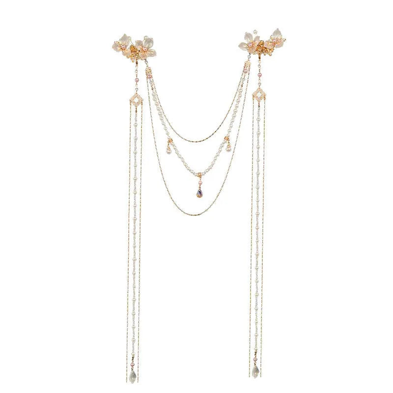 Gold women's hairpin with pearl flower decoration and long tassel detail