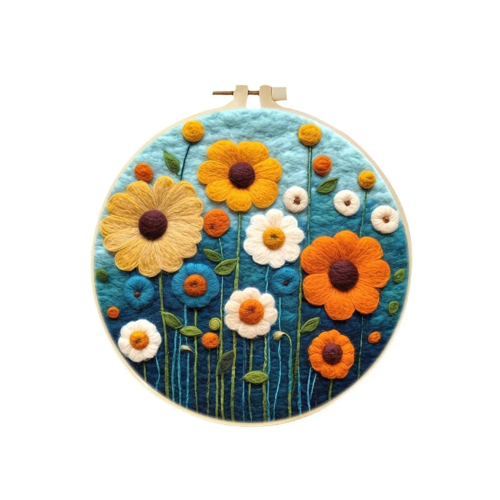 Round 20x20 cm linen embroidery kit with wool felt pieces for floral design and included embroidery frame.