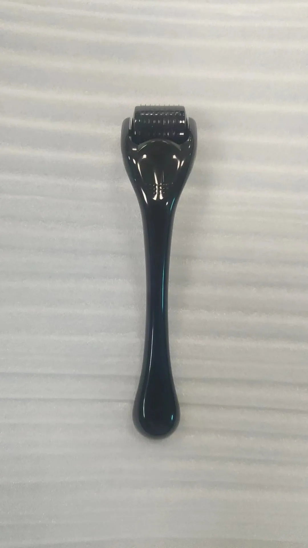 540 micro needle derma roller tool with black handle and purple wheel for 0.2mm 0.25mm 0.3mm cartridges.