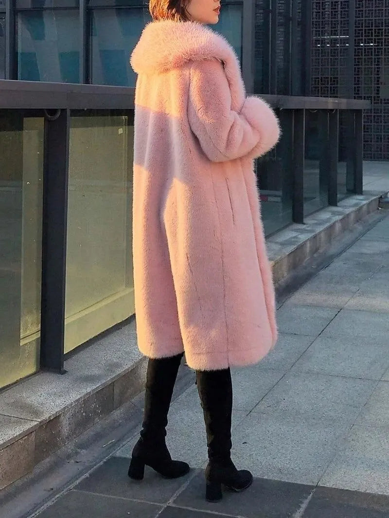 Women's thick grey faux rabbit fur mid-length coat with fur collar.