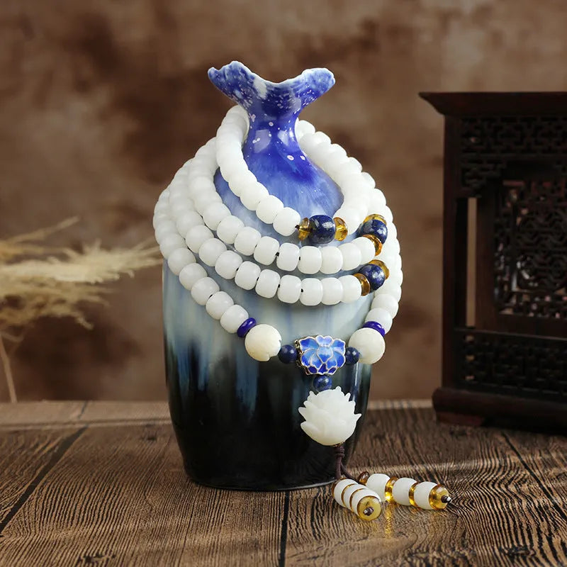 White jade Bodhi beads long bracelet with 6x8mm beads, showing various style options.