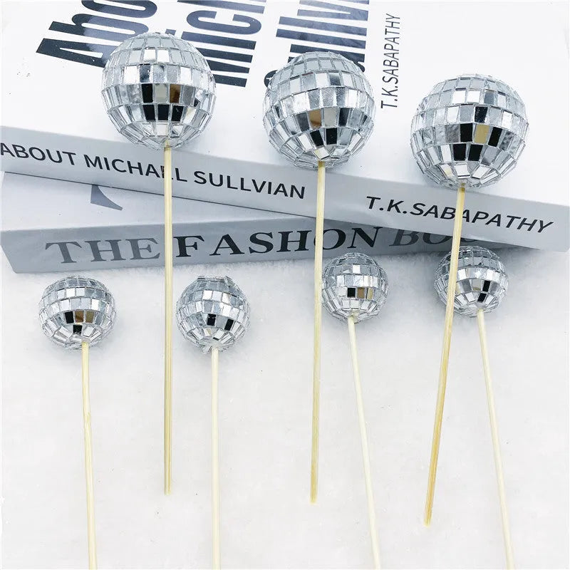 Glass disco ball cake decoration with wooden stick in multiple sizes for celebration cakes