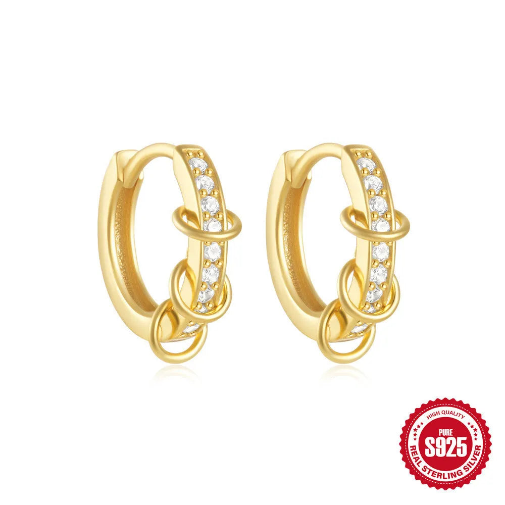 Small round geometric sterling silver stud earrings in gold and silver electroplated finishes.