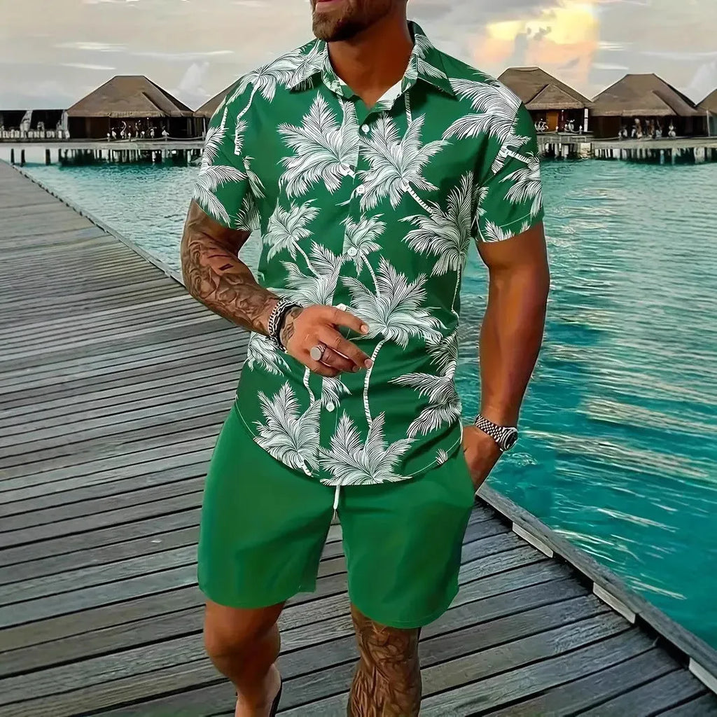 Man wearing a blue Hawaiian print short sleeve shirt and matching shorts from the casual suit set.