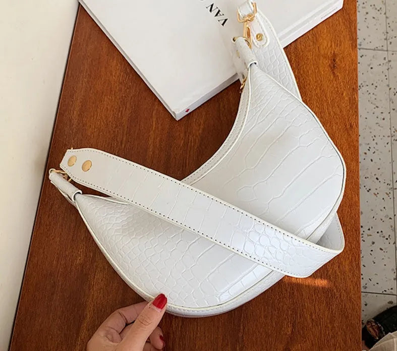 Fairy dumpling bag in PU with crossbody strap, 24cm wide, available in multiple colours