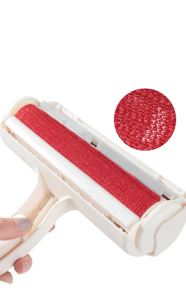 White plastic roller brush pet hair remover with sticky roller surface