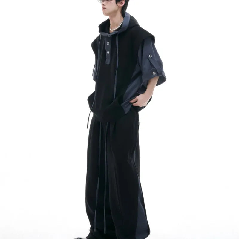 Men's black heavy industry style hooded jacket with three-dimensional stitching and matching grey joggers.
