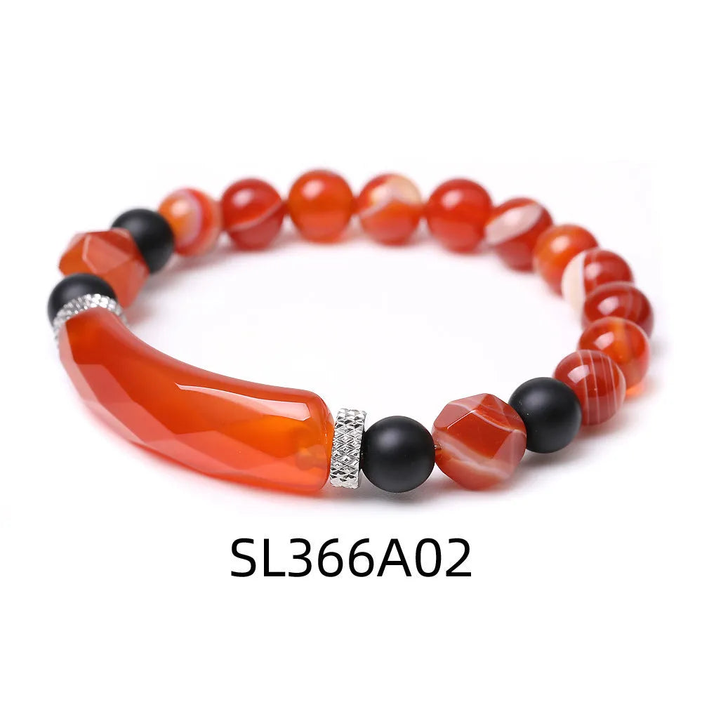 Black agate bracelet with diamond-shaped geometric cut and fan pattern detailing