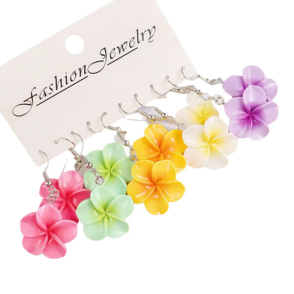 Handmade plastic resin earrings shaped like plumeria rubra flowers in a pair with multiple colour options