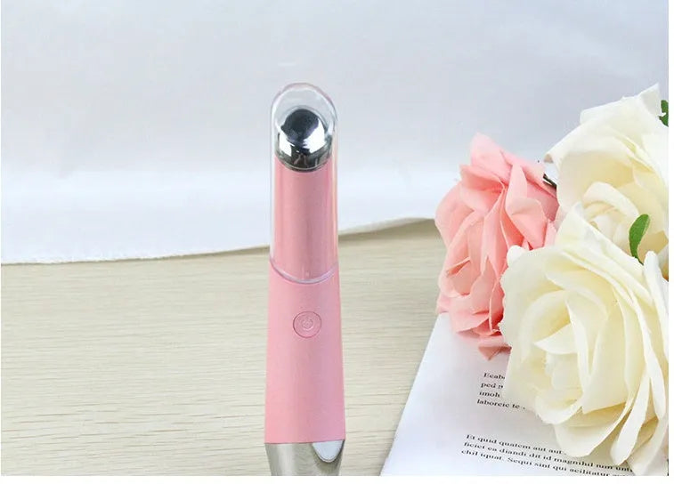 Mini eye massager electric vibration anti-ageing wrinkle removal pen in Pink and White with USB charging cable