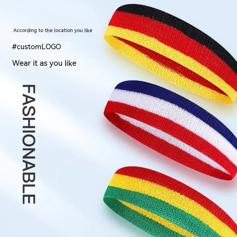 Multi-colour sports headband for adults shown in red, yellow and blue, with a size scale indicating 5.5 cm width.