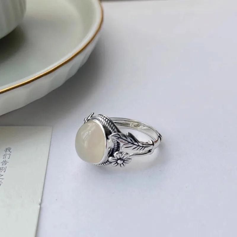 Adjustable copper ring with imitation white chalcedony stone and vintage styling