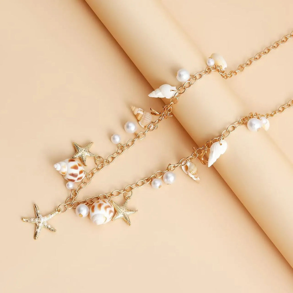 Women's summer beach waist chain with star pendant and matching bracelet jewellery set