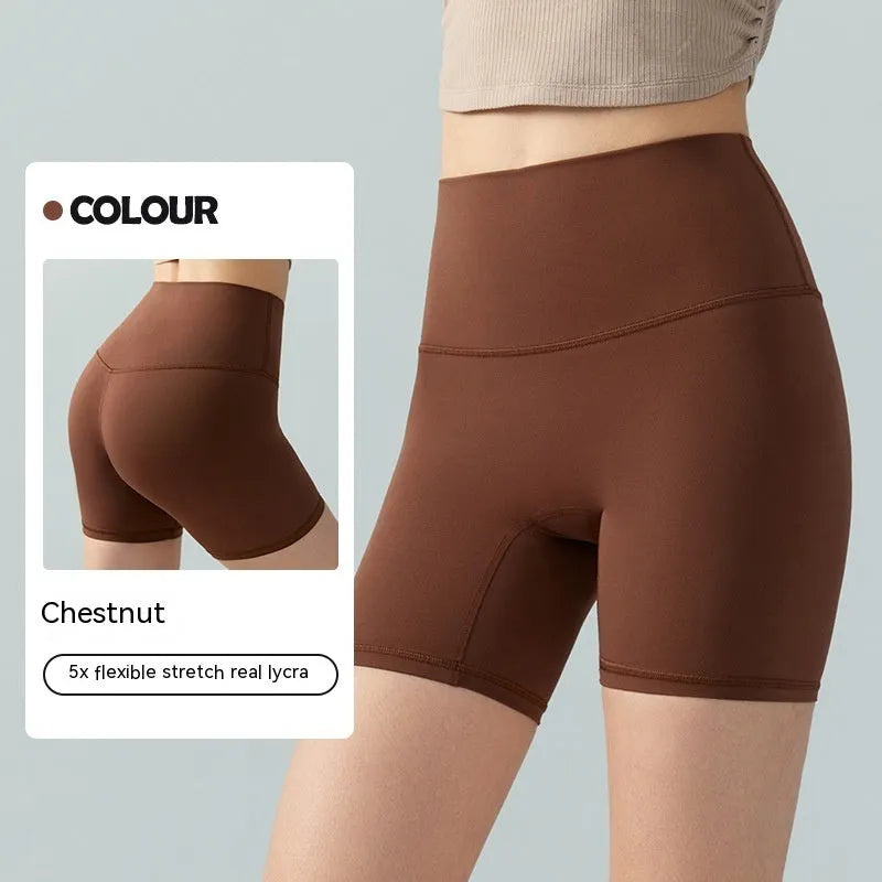 Women's lycra yoga tight shorts in leaf green colour showing high waist and short length design
