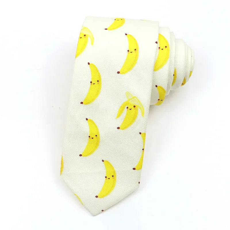 Narrow cotton bow tie with a printed cartoon pattern in a selection of colours.