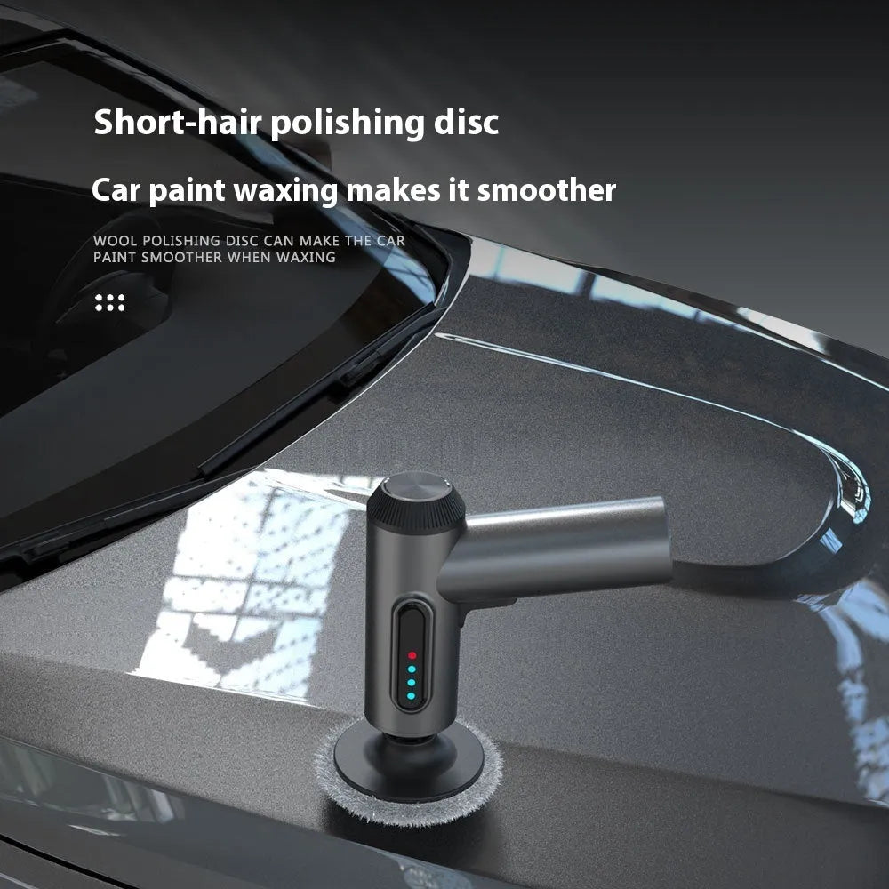 Wireless car polishing machine with three pads and charging cable on workbench