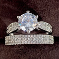 White gold geometric wedding ring bracelet with round elements on hand